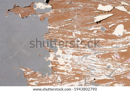 Close up of flaking paint on a wall.
