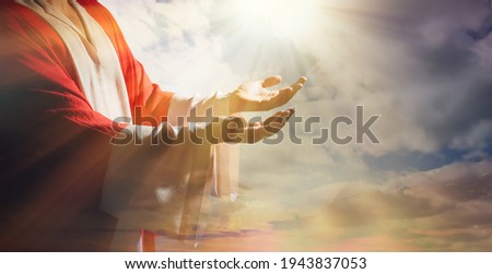 Jesus Christ reaching out his hands and praying at sunset, banner design Royalty-Free Stock Photo #1943837053
