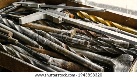 A set of metal tools in the workshop on an old rustic wooden background.concept.Father's day or labor day holiday