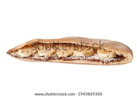 Falafel and fresh banana with chocolate  in pita isolated on white background