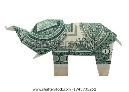 Money Origami ELEPHANT Profile With TUSKS Folded with Real One Dollar Bill Isolated on White Background