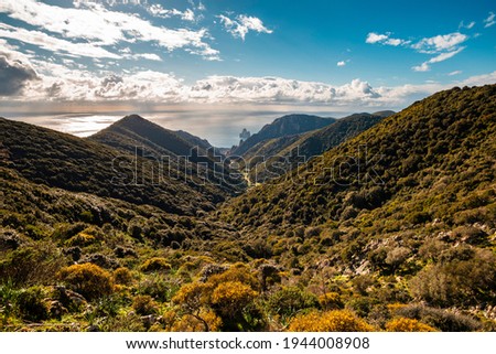 Panorama of the coast of Nebida and view of the famous rock called Pan di Zucchero, Sardinia, Italy 
 Royalty-Free Stock Photo #1944008908