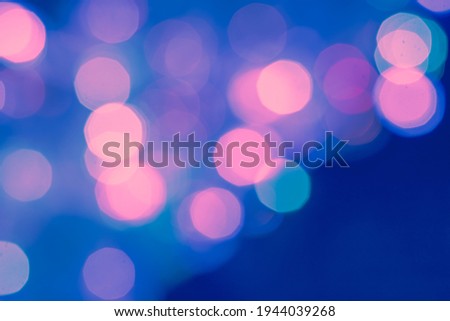 Abstract christmas glitter lights background.