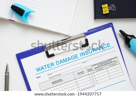 Financial concept meaning WATER DAMAGE INSURANCE with sign on the business paper 
