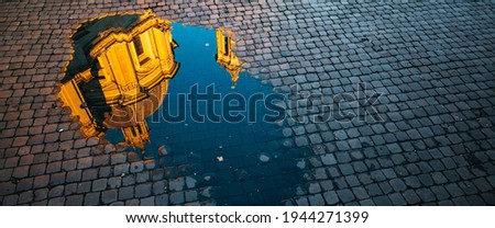 Reflection of Sant'Agnese in Agone, Navona Square, Rome, Italy