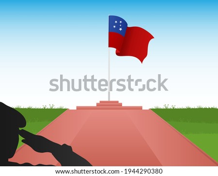 The Samoan flag flies over the pole in the shadow of a soldier saluting the flag