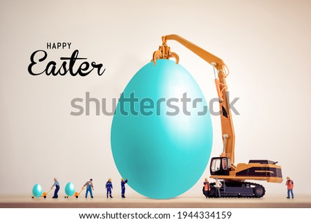  construction happy Easter. miniature worker people working on an egg, Easter holiday concept for business construction companies