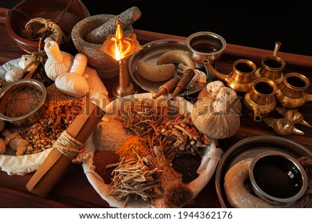 Ayurveda accessories collected on table Royalty-Free Stock Photo #1944362176
