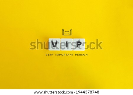 VIP (Very Important Person) banner and concept. Block letters on bright orange background. Minimal aesthetics. Royalty-Free Stock Photo #1944378748
