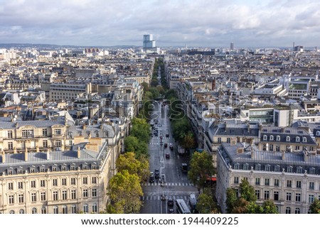 Looking out over the beautiful tree lined streets of Paris Royalty-Free Stock Photo #1944409225