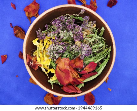 Various kinds of herbal tea. Natural herbs medicine. Top view. Herbal harvest collection and bouquets of wild herbs. Alternative medicine.