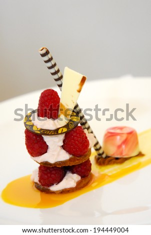 Strawberry dessert with whipping cream and pudding