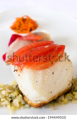 Grilled fillet of seabass with side dishes