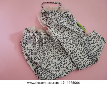 leopard skin dress with flower 