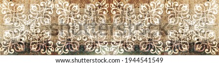 Seamless old aged weathered grunge brown gray rusty vintage worn shabby patchwork motif tiles stone concrete cement wall texture background banner panorama banner with ornate floral flower leaf print
