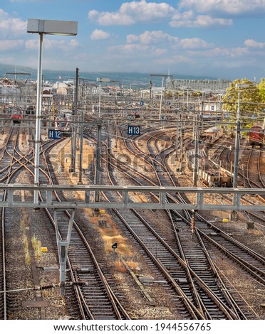 Train tracks in the Swiss city of Geneva on a cloudy day