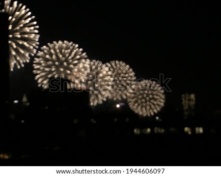 Background of fireworks behind city skyline