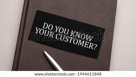 Do you know your customer sign written on the black sticker on the brown notepad. Tax concept