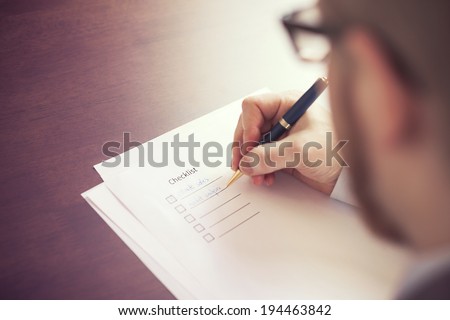 Filling Tasks to Checklist Royalty-Free Stock Photo #194463842