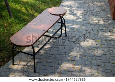 Simply wooden table top of outdoor seat, stock photo