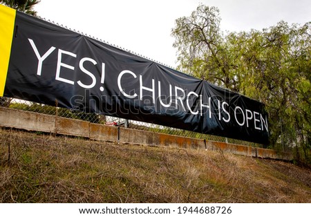 Sign Stating Church Is Now Open 
