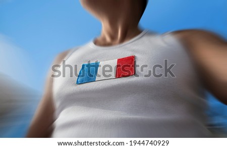 The national flag of France on the athlete's chest