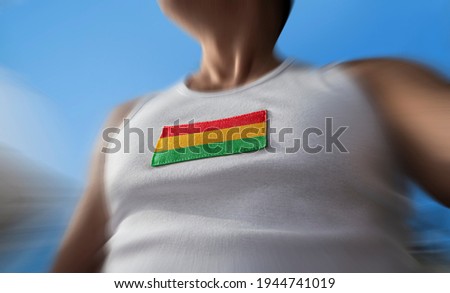 The national flag of Bolivia on the athlete's chest