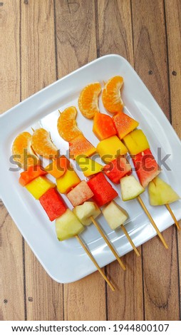 Fruit satay is a satay consisting of various kinds of fruits. Fruit satay contains many vitamins. The attractive appearance of the fruit satay makes children love it.