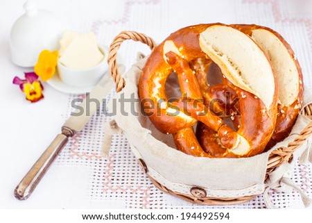 Tasty german pretzels in little basket. Selective focus