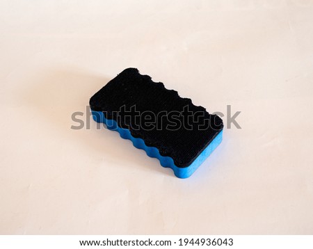 Close up of a blue and black sponge