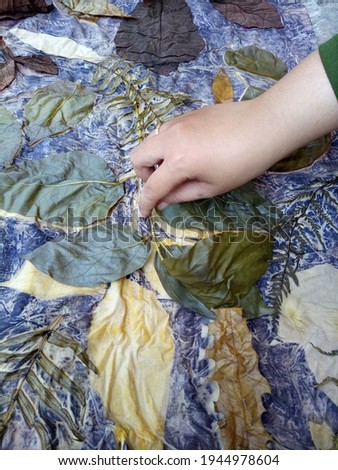 this year's much sought-after ecoprint scarf, gray and yellow. ecoprint made with natural dyes, leaves, flowers and tree bark. unique and distinctive