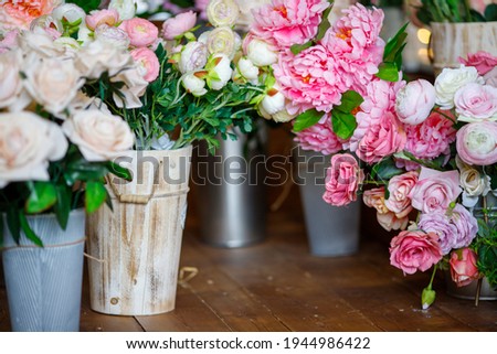bouquets of flowers in vases