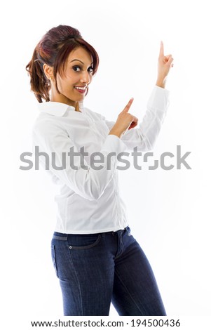 Indian young woman pointing with both hands