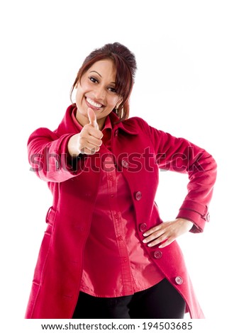 Smiling Indian young Woman showing thumb up sign isolated on white background