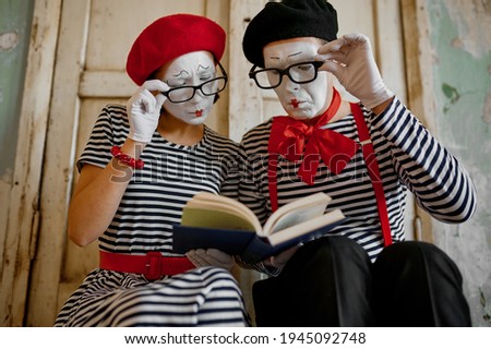 Two clowns in glasses, mime artists, parody comedy