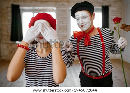 Mime artists, surprise with rose scene
