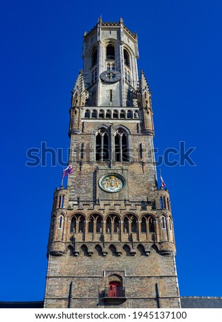 A picture of the Belfry of Bruges as seen from the square below.
