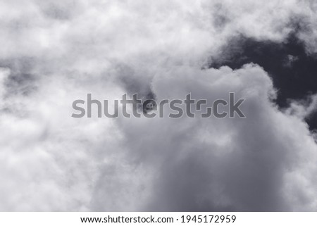 Black and white of puffy cumulus clouds