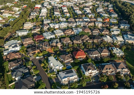 High angle aerial view of an upmarket houses and streets, north west Sydney, Australia. Royalty-Free Stock Photo #1945195726