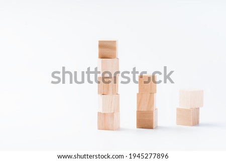 Wooden cubes on a white background for use in conceptual texts.Business concept.copy space. place for text on a white background. Conceptual photo.wooden blocks