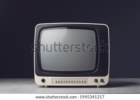 Vintage analog TV with knobs, vintage electronics concept Royalty-Free Stock Photo #1945341217