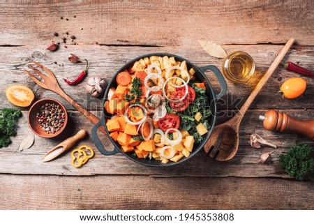 Organic vegetarian ingredients and kitchen tools. Healthy, clean food and eating concept. Top view. Copy space. Ingredients for cooking on wooden table. Vegan diet concept with copyspace. Zero waste.