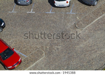Graphic brick paved parking area with cars. See more in my portfolio