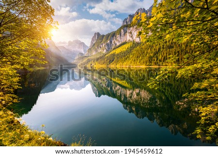 Splendid scene of alpine lake Vorderer Gosausee. Location place of famous resort Salzkammergut, Gosau Valley, Upper Austria, Europe. Dachstein glacier. Photo wallpaper. Discover the beauty of earth.