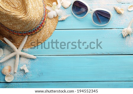 beach accessories on wooden board Royalty-Free Stock Photo #194552345