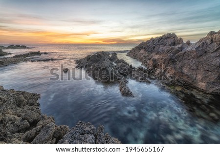 Beautiful colors of sunrise on a small island in the Mediterranean Sea.