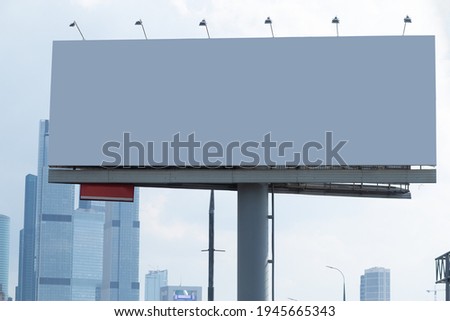 big clean billboard against the backdrop of skyscrapers