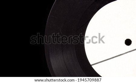 Scratching vinyl record music closeup background. Broken vinyl isolate. Nostalgia music pattern. Old vinyl plate. Melancholy vintage stylized photo.