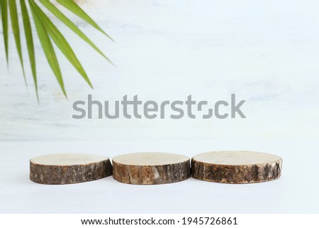 product display concept. minimal scene with wooden shapes on beige background