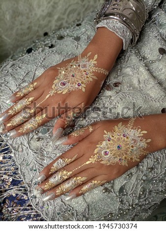 white henna painting wedding hands